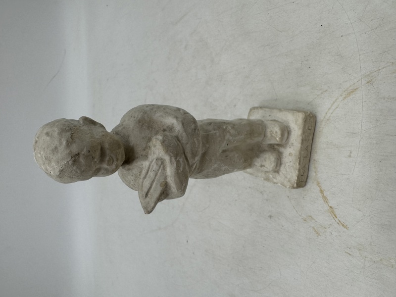 Liten gips figur.