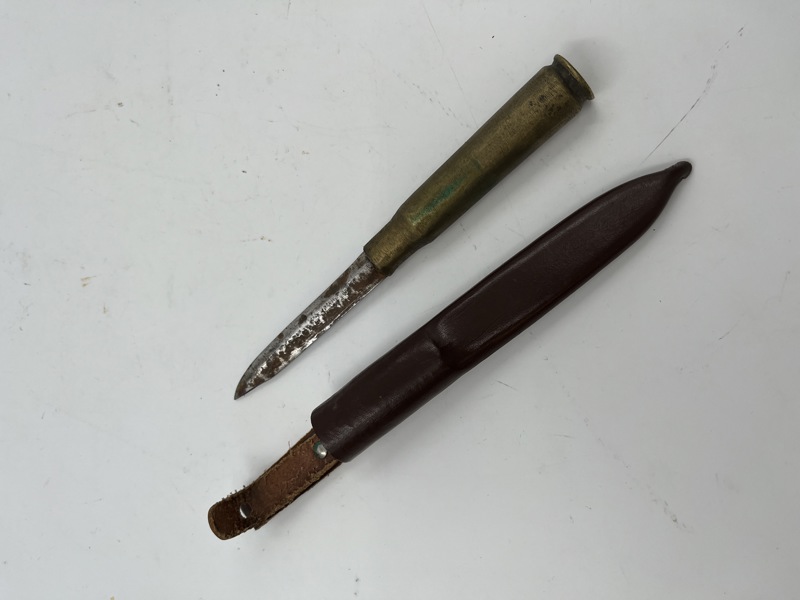 Tollekniv skjefte laget av patron