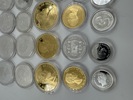 24 Minnemynter i sølv og noen gullforgylte