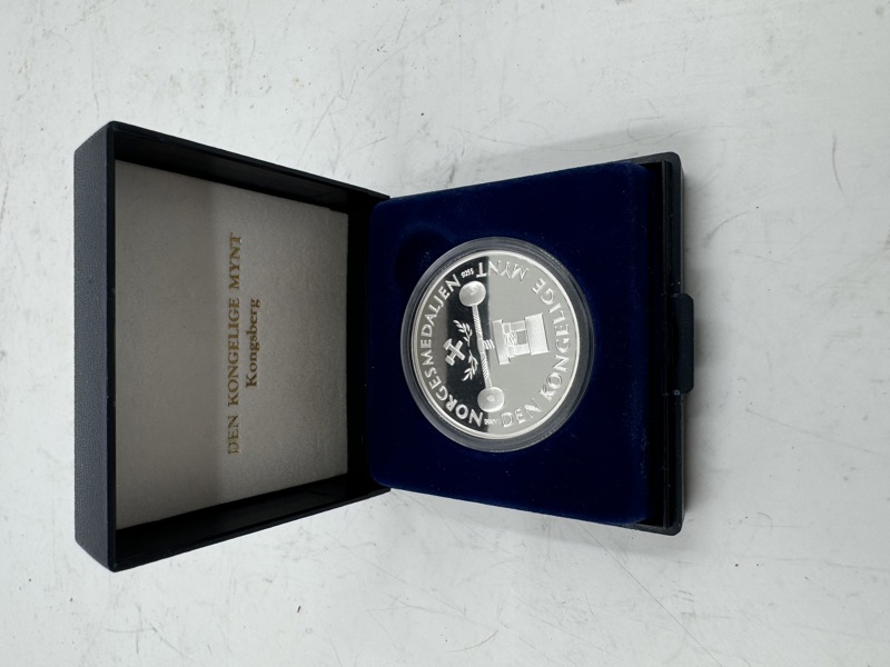 Norgesmedaljen 1998 i sølv.