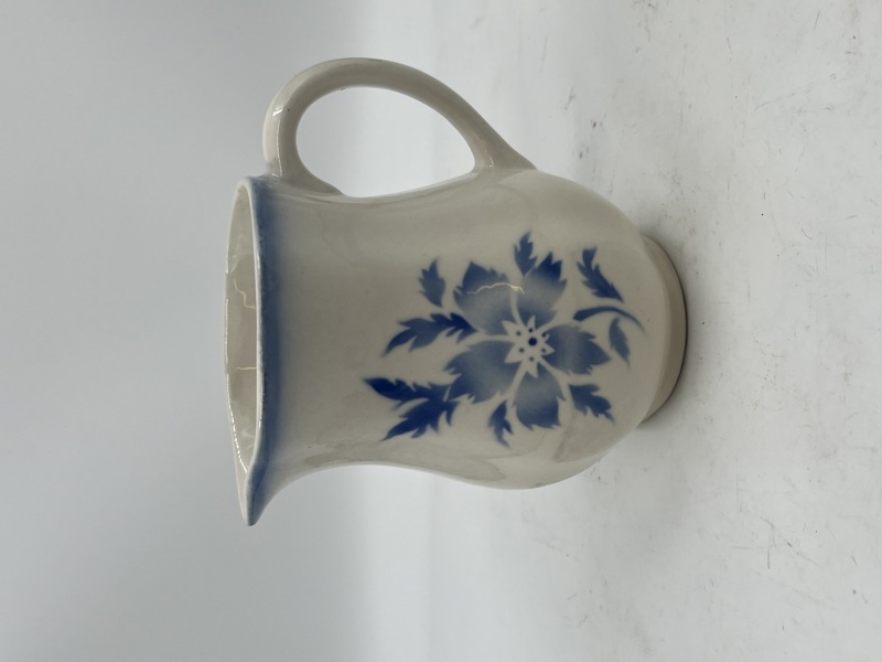 Flott arabia porselen melke mugge.