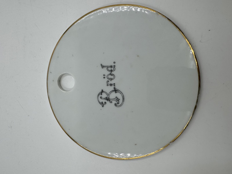 PP-Rund fjøl for vegg med tekst.