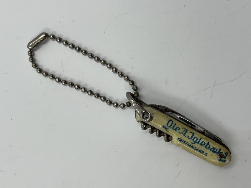 Liten lommekniv med reklame