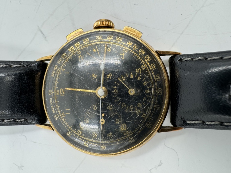 Gullklokke 18 karat med skinnreim