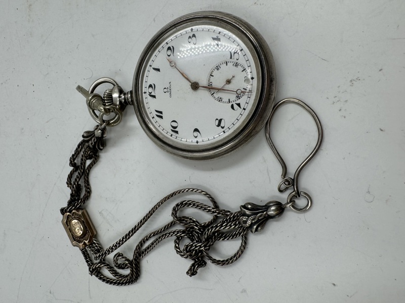 Lommeur Omega med klokkekjede