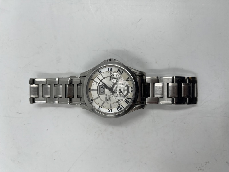 Seiko Premier Kinetic Perpetual herreklokke med urkasse i stål og lenke
