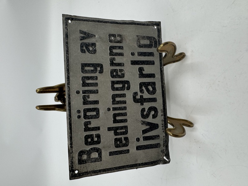 Blikkskilt Berøring