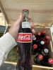 24 coca cola flasker ( noen tomme)